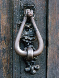 27 old brass knocker on a door in chetumal  mexico 800