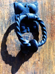 38 wrought iron ring knocker photgraphed in belize 800