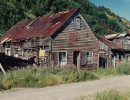 8 old wooden home on the side of a dirt road in chile 800