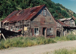 8 old wooden home on the side of a dirt road in chile 800